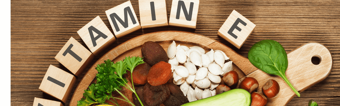 Tocopherol Vitamin E in a healthy food arrangement showcasing nuts, seeds, and greenery for glowing skin.